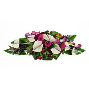 Afscheidsbloemen grafbloemstuk rode rozen