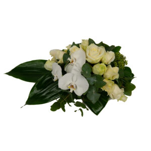 Afscheidsbloemen orchideeën kistversiering